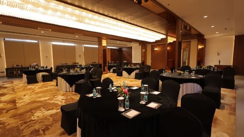 view of the banquet hall with chairs and tables at Pride Elite, Haridwar