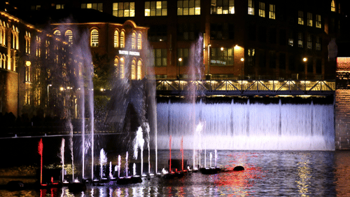 A colourful fountain show during night