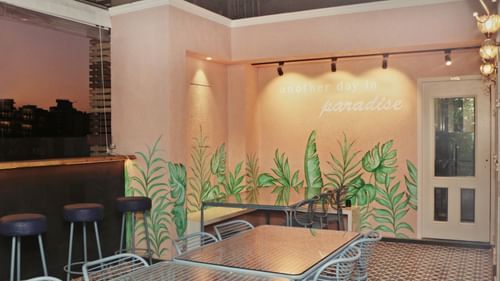 dining area in balcony offering the mesmerising views of the city