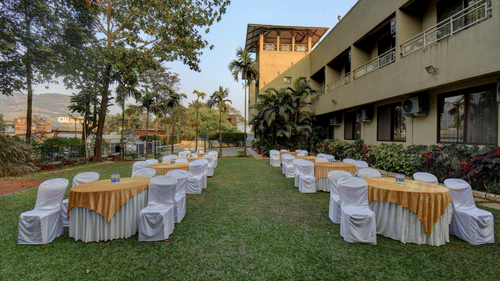 A wedding lawn setup with banquet seating for outdoor events at VITS Lonavala.