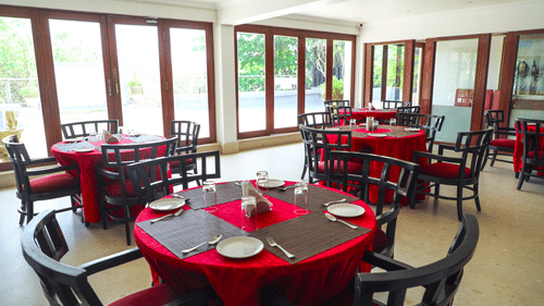 seating in the restaurant at White pearl suites by rosetum 