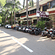 Outer view of Facade of Hotel Shivam, Pune featuring a parking area