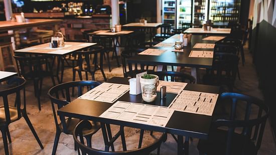 tables and chairs in a restaurant