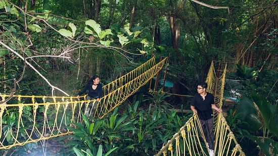 two people walking in two Burma Bridges in the night - Black Thunder, Coimbatore