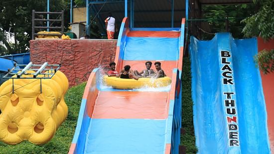 an overview of the Downhill Rapid Slide water ride - Black Thunder, Coimbatore