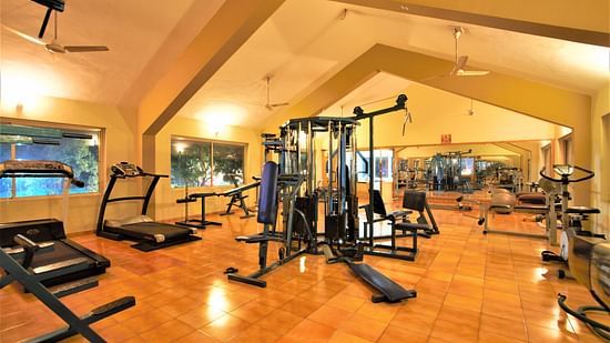 Damanganga Valley Resorts Pvt Ltd - gym equipment in a fitness centre