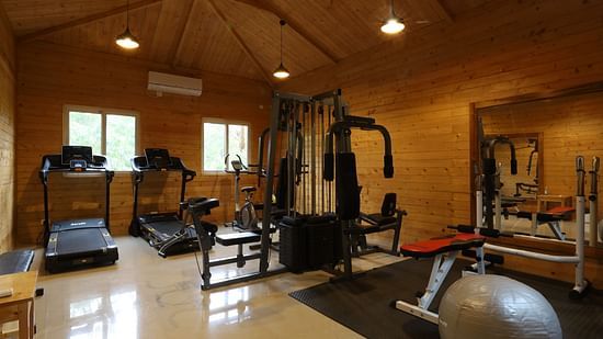Interior of gym with gym equipments at Louts Eco beach Resort Konark.