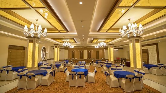 interior of Royal Velvet arrayed with elegant seating arrangements at Ramada by Wyndham Kapurthala