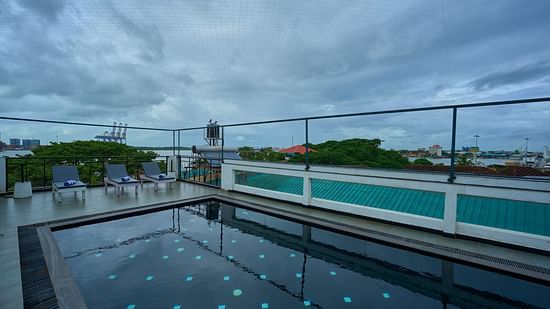 image of the pool at the old court house by abad, fort kochi
