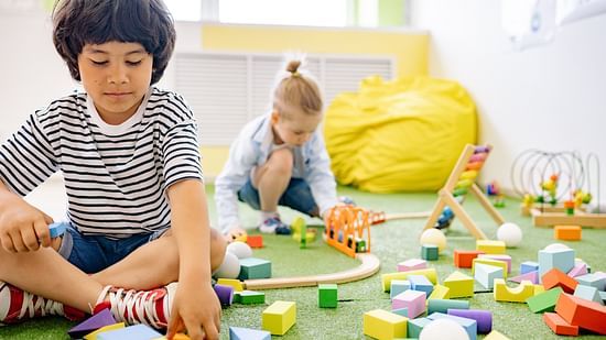 Children playing with building blocks
