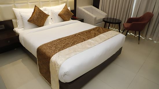 Udman By Ferns N Petals Chattarpur - superior room with luxury a bed