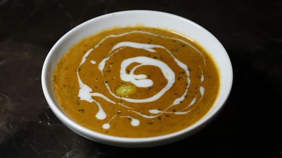 Udman By Ferns N Petals, Chattarpur - dal makhani plated on a restaurant table