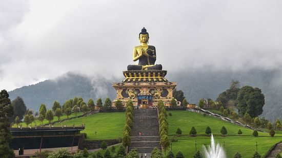 an image of the popular Buddha Park in Sikkim with the statue of Lord Buddha meditating amidst a green park
