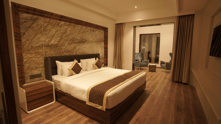 superior room with king size bed at Classic Sapphire by Ananta