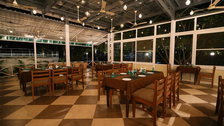 Picture featuring the dining area, well lit in the evening - MGM Whispering Wind's Resorts
