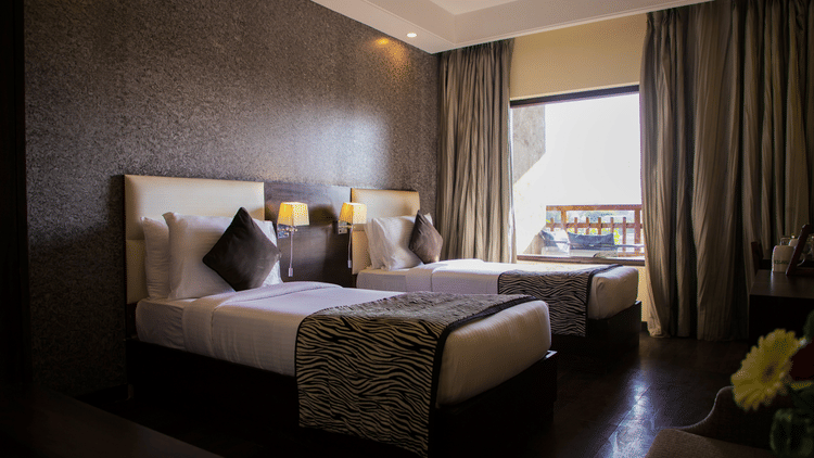 Twin room with plush beds