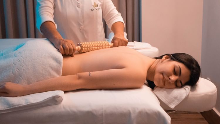 A person receives a back massage