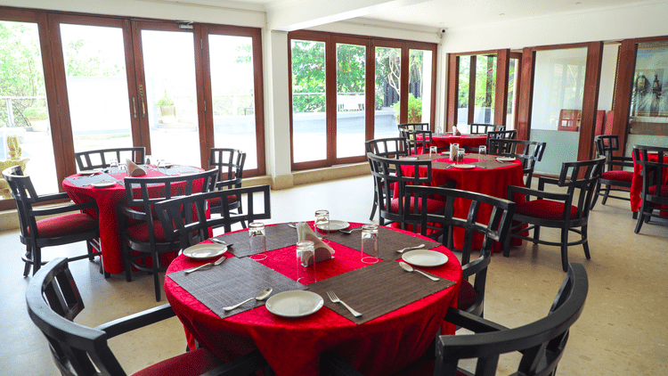 seating in the restaurant at White pearl suites by rosetum 