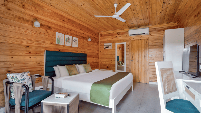 Lawn-view room featuring a cozy bed and air conditioning at Aralea Beach Resort by Stone Wood, Morjim