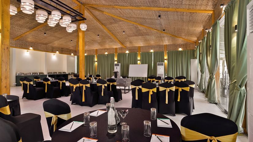 Banquet hall with serene interior decoration at Aralea Beach Resort by Stone Wood, Morjim