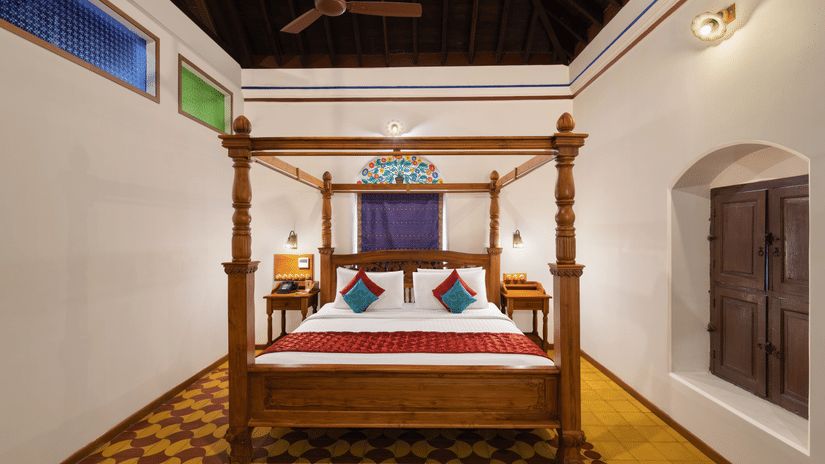 An overview of the suite with a double bed in view at Chidambara Vilas, a premium resort stay in Pudukkottai