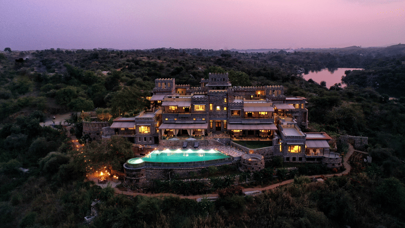 An aerial view from a drone of Chunda Shikar Oudi with the swimming pool in full view. 