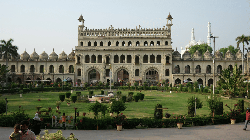 A widee shot of Bara Imambara in Lucknow, with bright blue sky in the background.