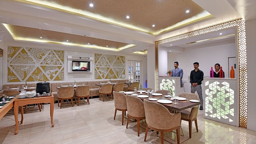 Seating arragements with the staff behind the counters at the Bridge - Clarks Residences Nainital