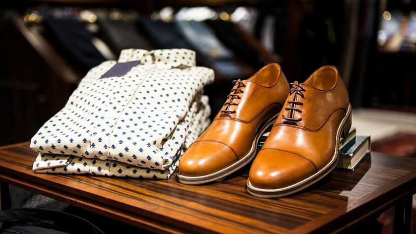 Shoes and shirts put on display in a shop