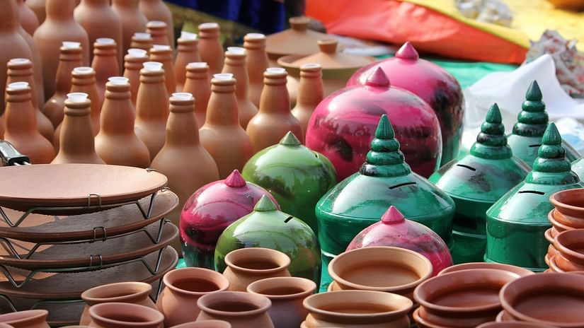 An array of colourful hand made pots placed for sale