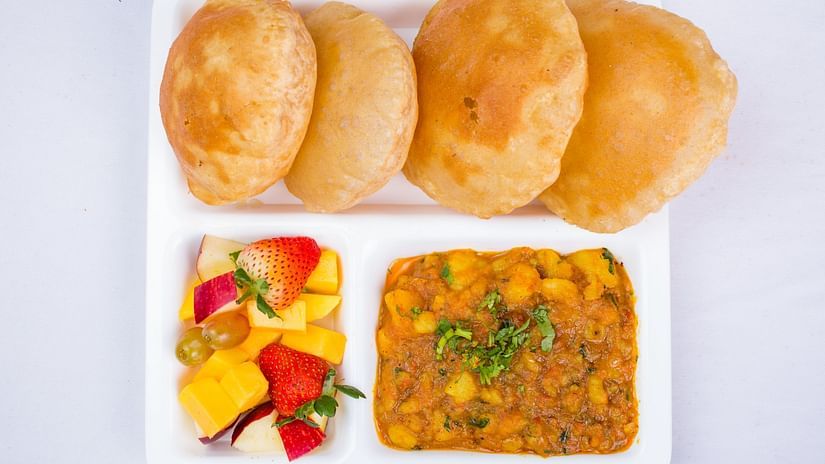 Deep fried flat bread with mashed potato curry