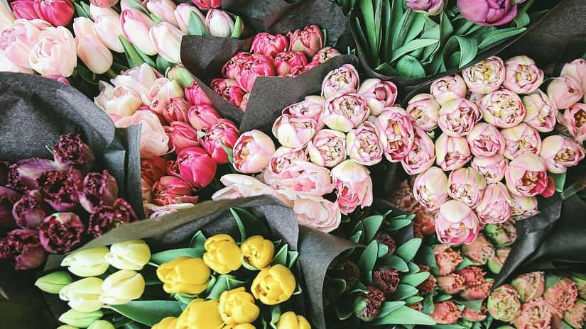 an overview of a flower shot with many roses kept in a bouquet for sale