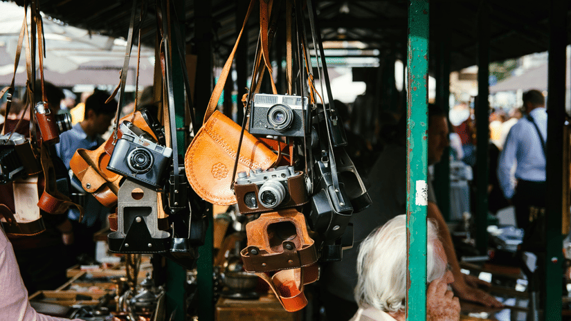 A camera market with a focus on a shop having different types of cameras kept to be sold at Dharamtala Market Kolkata