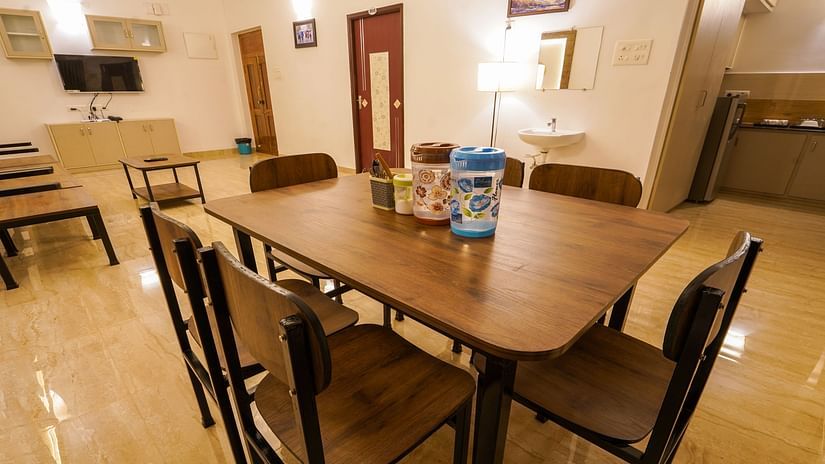 Dining area with a table for 6 set up inside Three Bedroom Villa - La Tamara Luxury, Pondicherry