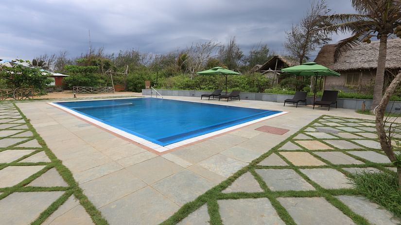An overview of the Swimming pool area of Louts Eco beach Resort Konark.