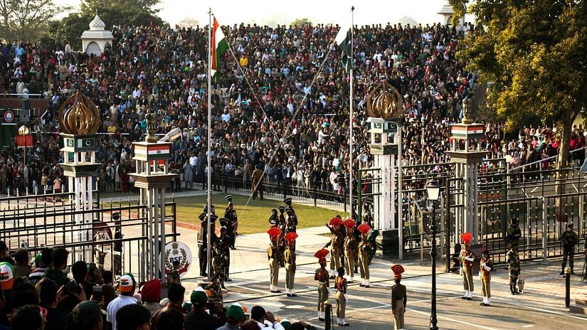A patriotic crowd witnessing the ceremonial flag-lowering event at the Wagah Border