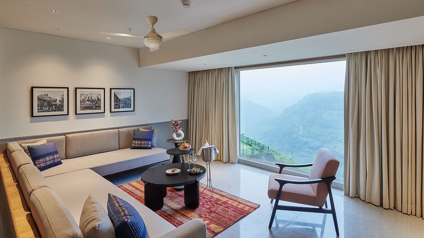 Image of a sitting area with a large window overlooking the valley at The Dukes Retreat.