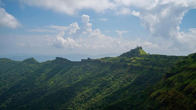 View of Sahyadri hill ranges with cloudy sky in the background, a perfect picnic spot near Mumbai