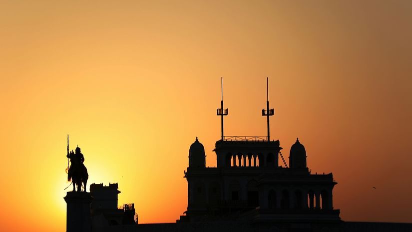 Palace silhouette during a sunset in Jamnagar with orange hues in the sky