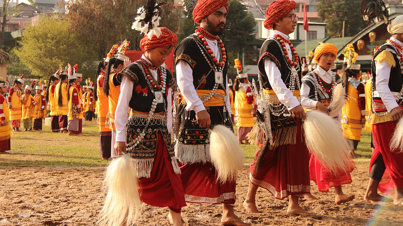 Young Khasi men doing a traditional performance