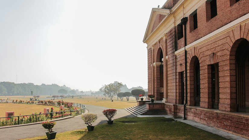 Forest Research Institute - Stunning colonial architecture of the Forest Research Institute surrounded by lush greenery.