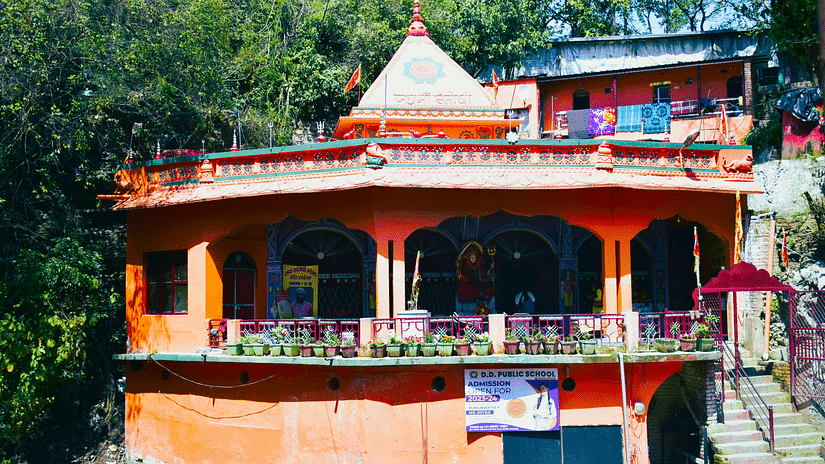 Tapkeshwar Temple - Sacred Shiva temple inside a cave with water dripping onto the Shivling.