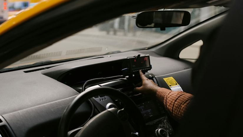 A close up shot of a car which is being driven