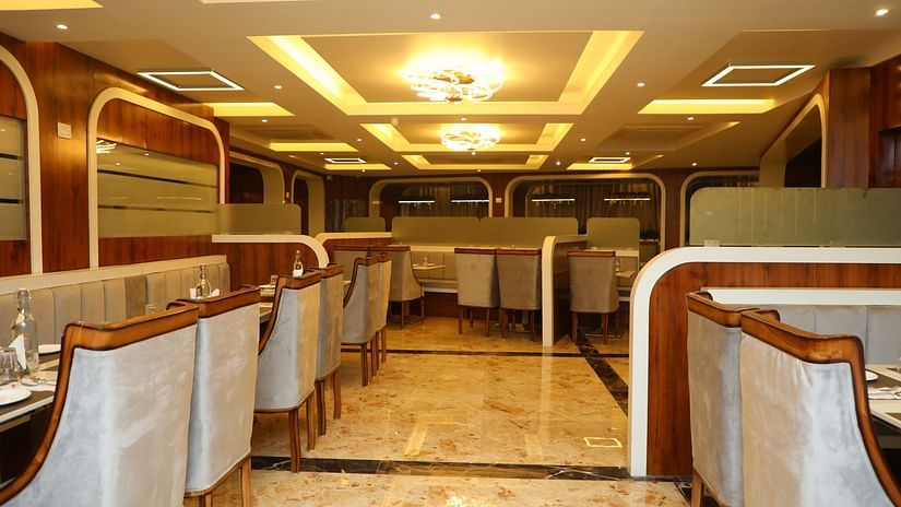 Elegant dining area with modern lighting and comfortable seating arrangements at VITS Select Grand Inn, Ratnagiri