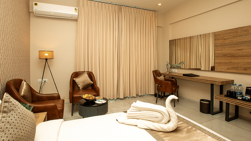 Picture of the interior of the well furnished  room with a king bed