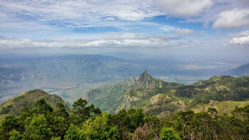 a sunset view point with hills surrounding