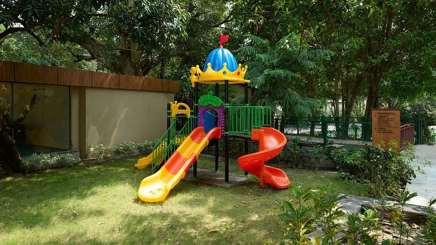 a slide in the kids play area at ABN Sarovar Portico, Jim Corbett