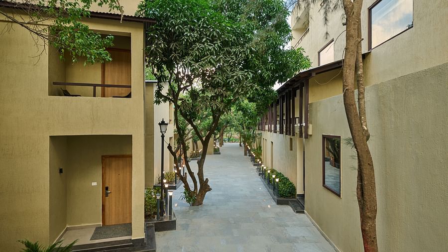 exterior facade of two buildings at ABN Sarovar Portico, Jim Corbett during the day