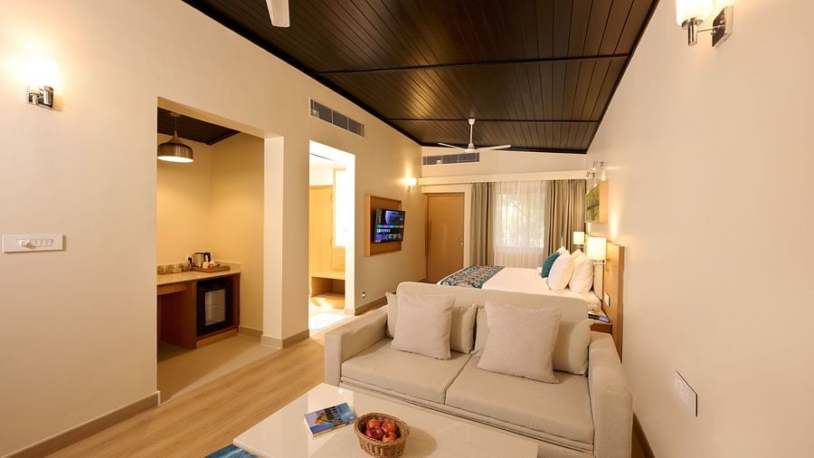 view of the sofa and coffee table in the Cottage at ABN Sarovar Portico, Jim Corbett