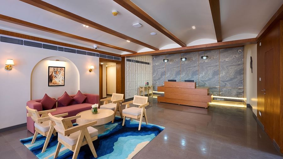 view of the waiting area and reception desk at ABN Sarovar Portico, Jim Corbett